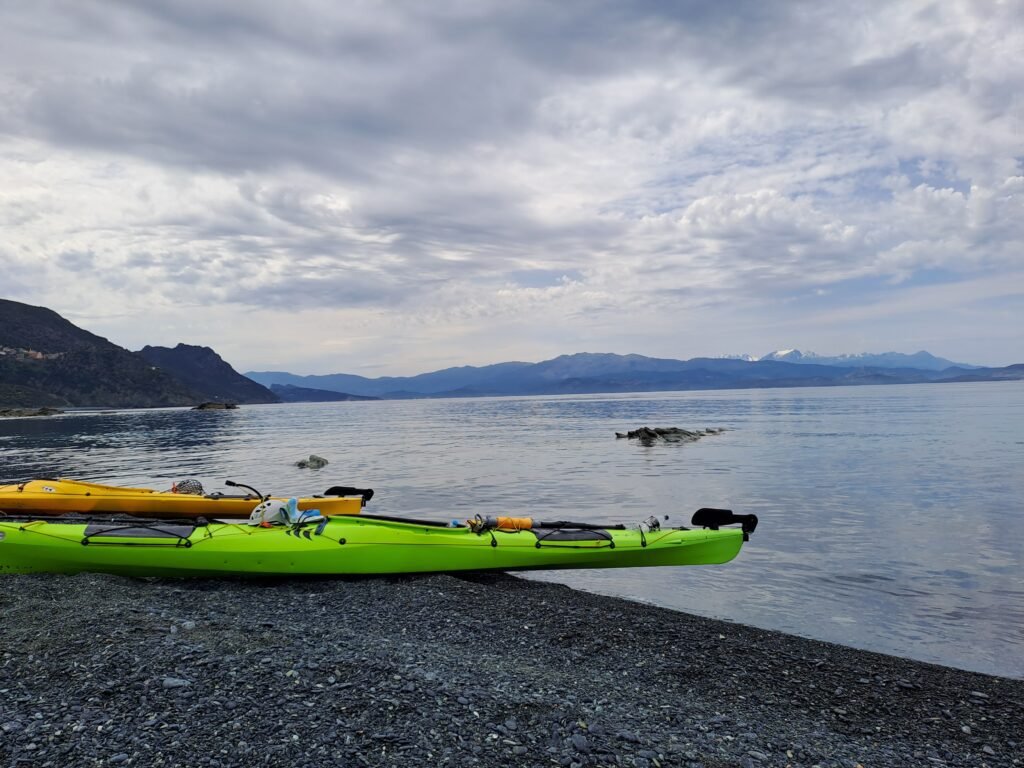 Both kayaks on the beach before leaving for a sea fairing in Corsica