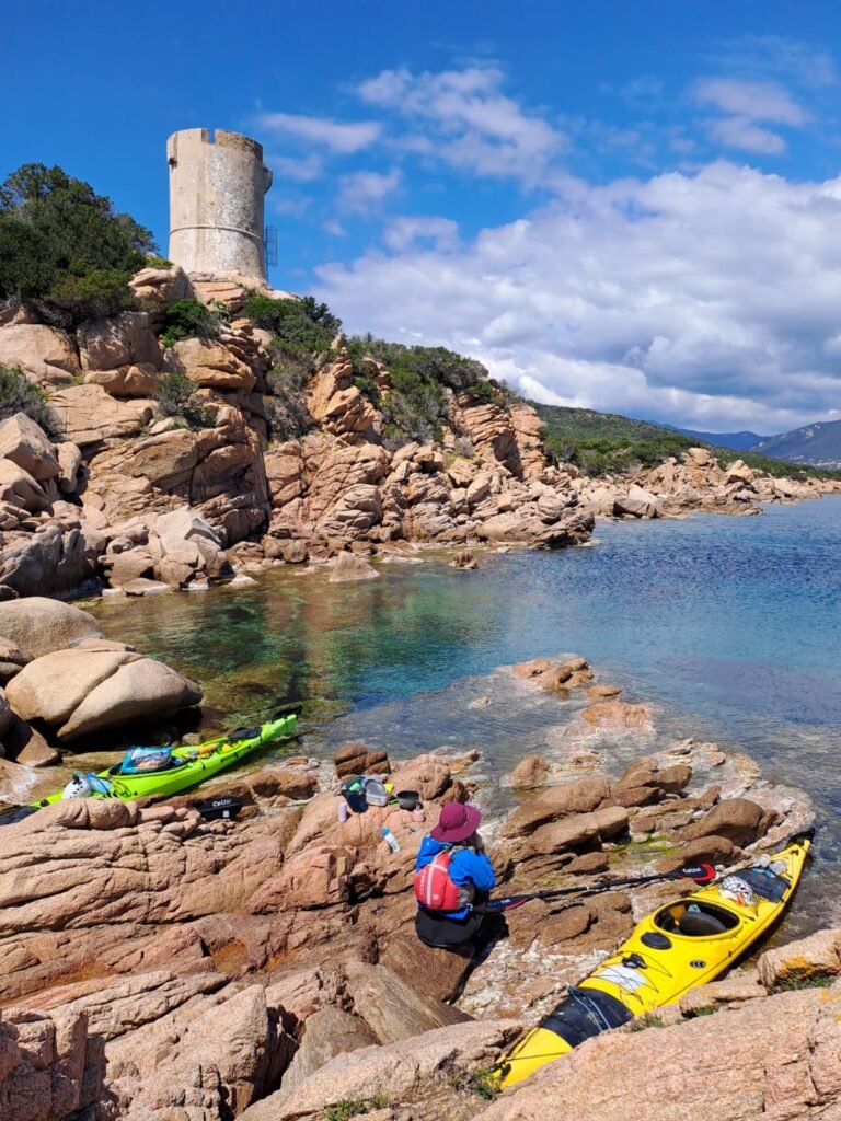 Tina on her last bivouac with a Genoese tower in the background